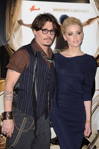 Johnny Depp's Wife Amber Heard In Trouble Because Of Dogs
