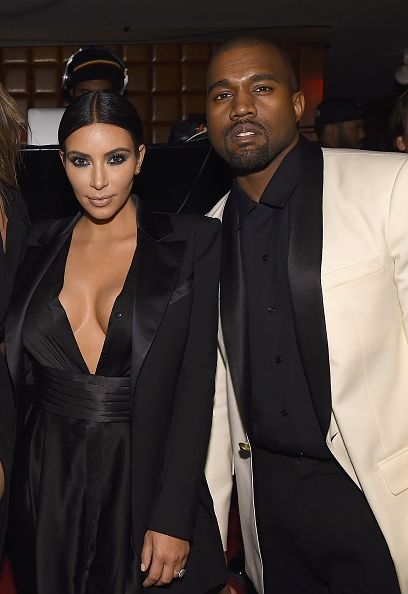Kim Kardashian et Kanye West assistent John Legend's birthday party.